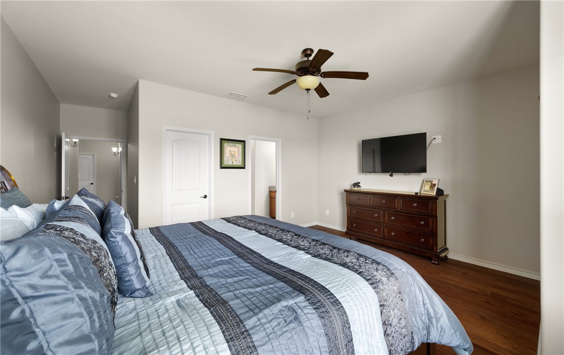 5310 Capernaum Court Corpus Christi, TX 78413 - Photo 27 of 40 a bedroom with a bed and a flat screen tv
