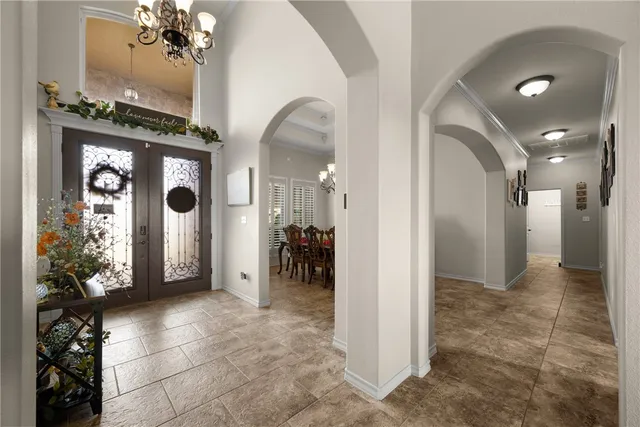 a view of a hallway with livingroom