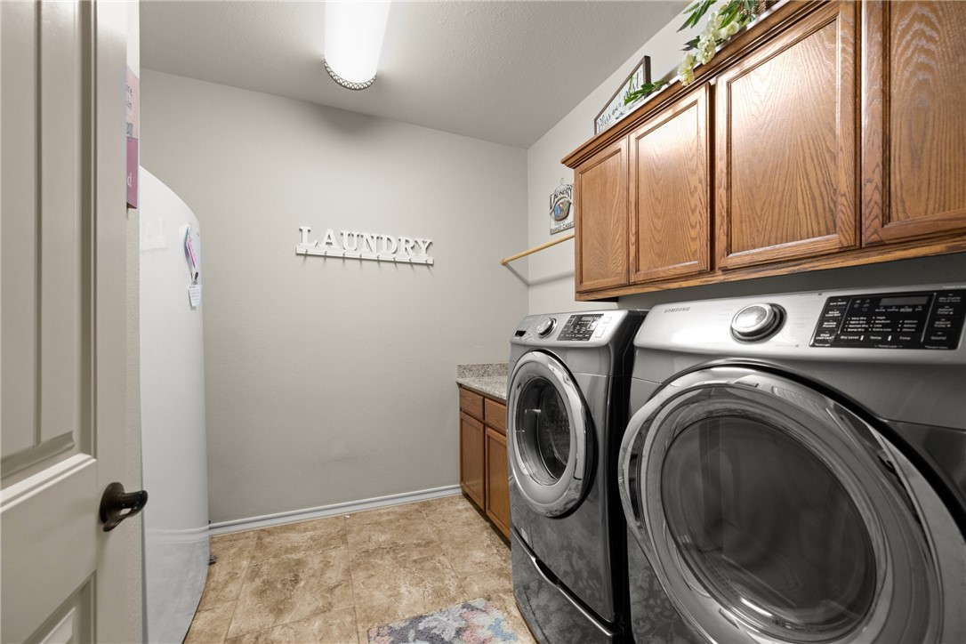 5310 Capernaum Court Corpus Christi, TX 78413 - Photo 29 of 40 a view of bathroom with washer and dryer