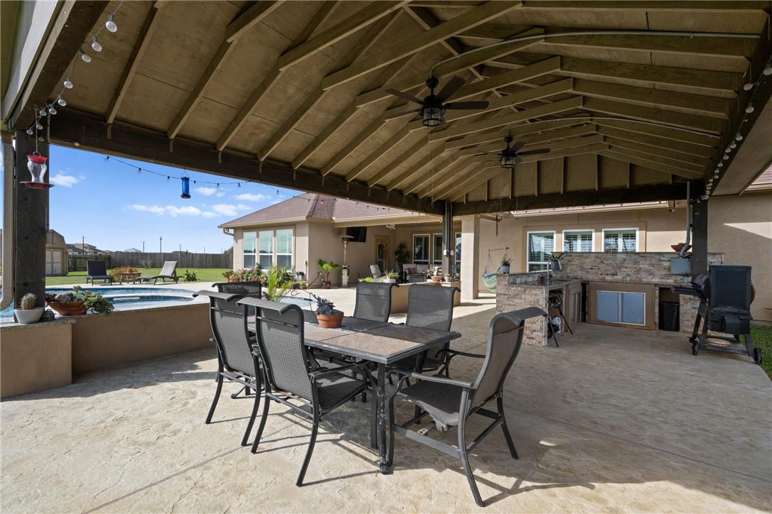 5310 Capernaum Court Corpus Christi, TX 78413 - Photo 34 of 40 a view of a dinning table and chairs in the patio
