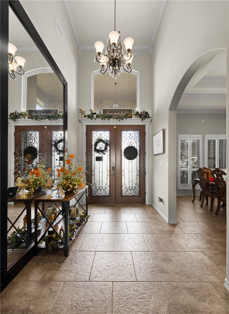 5310 Capernaum Court Corpus Christi, TX 78413 - Photo 4 of 40 a view of a livingroom with furniture and a chandelier