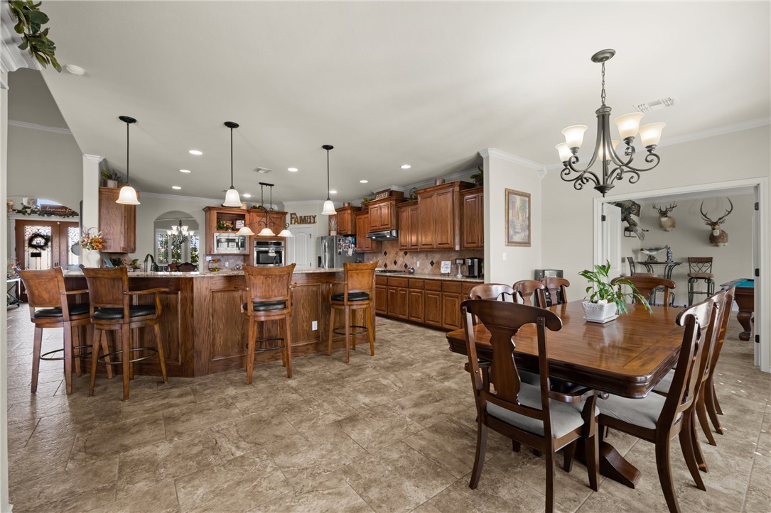 5310 Capernaum Court Corpus Christi, TX 78413 - Photo 9 of 40 a view of a dining area with furniture