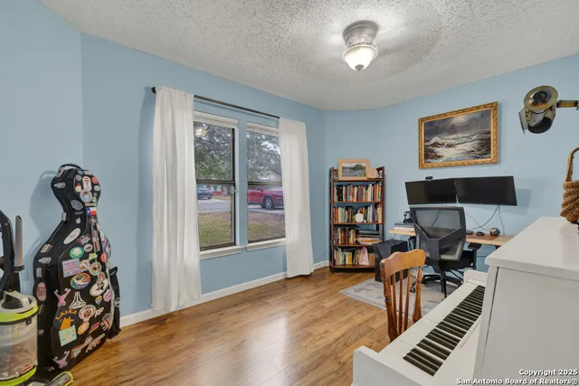 a living room with furniture or couch and a window