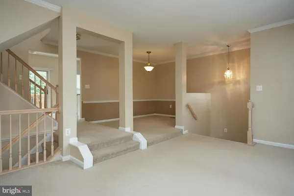 an empty room with entrance and door