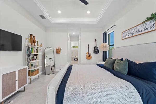 a en suite bathroom with a sink a mirror and a shower