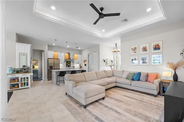 a living room with furniture and a table
