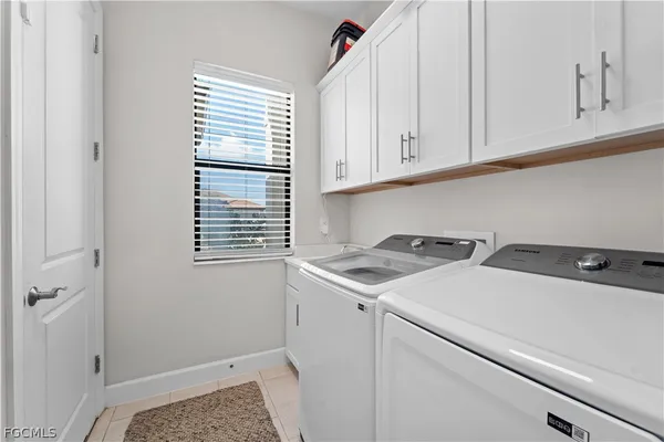 an aerial view of residential building with ocean