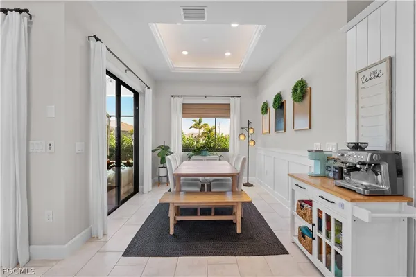 a kitchen with stainless steel appliances kitchen island granite countertop a sink and cabinets