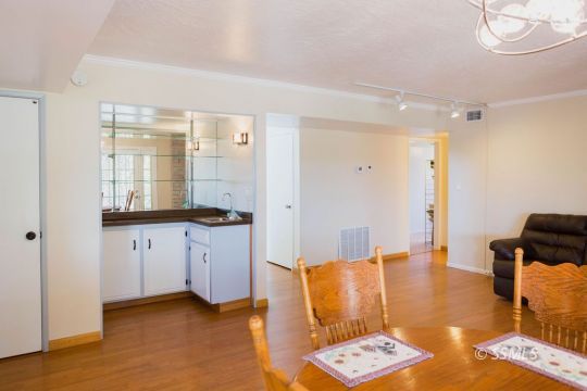 712 Peg Street Ridgecrest, CA 93555 - Photo 13 of 44 a living room with furniture and a window