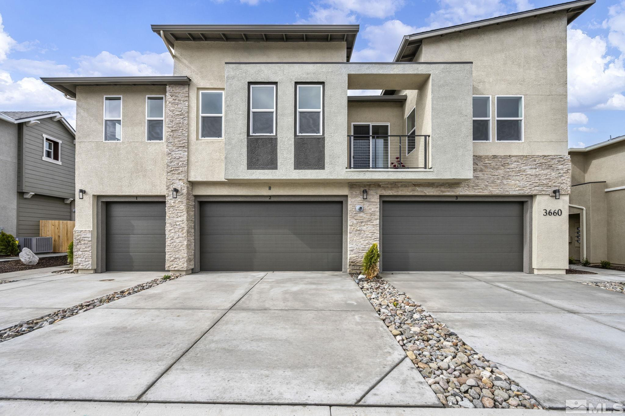 3660 Flare Lane, Unit 22 Carson City, NV 89705 - Photo 1 of 22 a front view of a house with yard