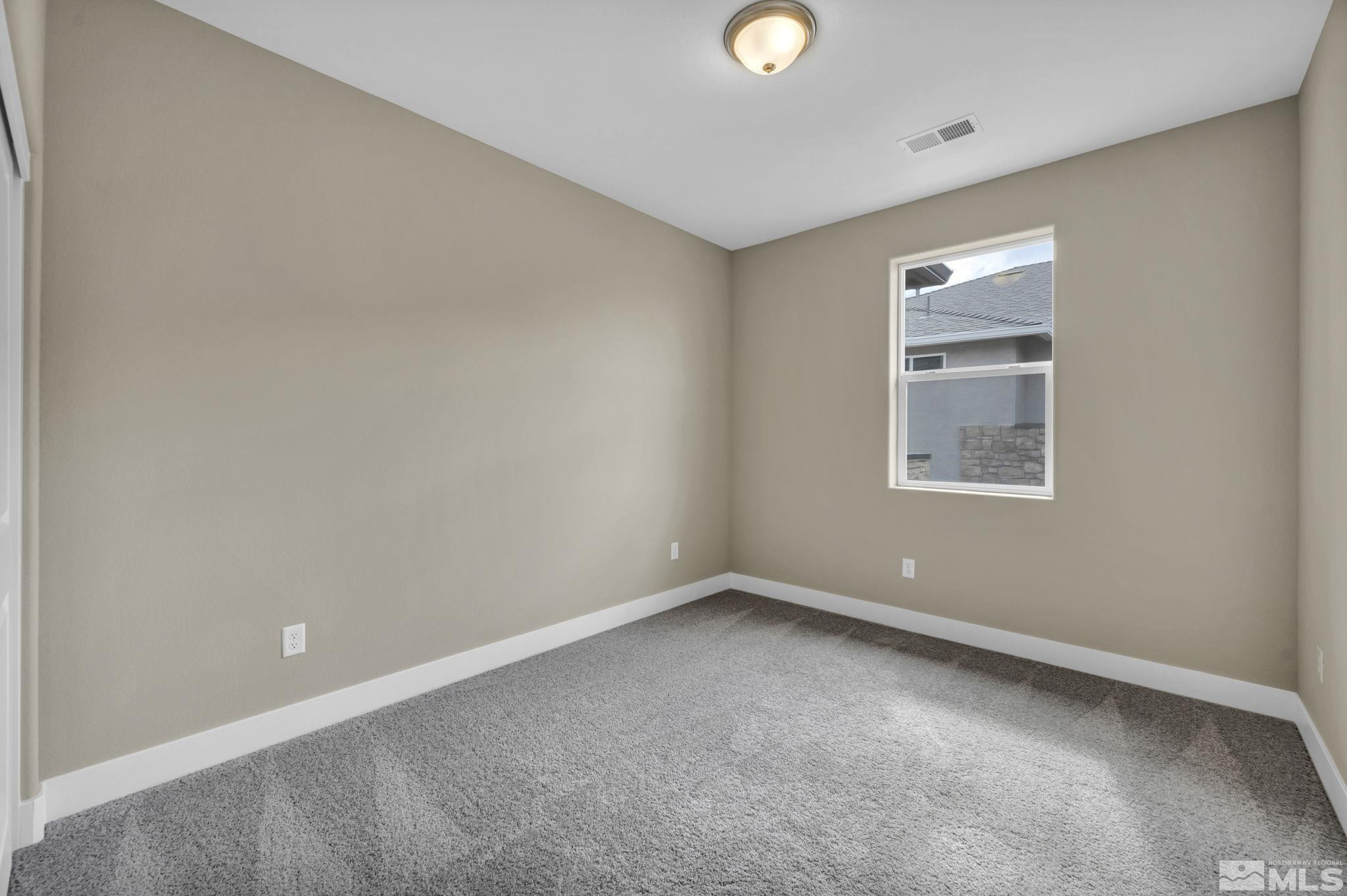 3660 Flare Lane, Unit 22 Carson City, NV 89705 - Photo 14 of 22 an empty room with a window