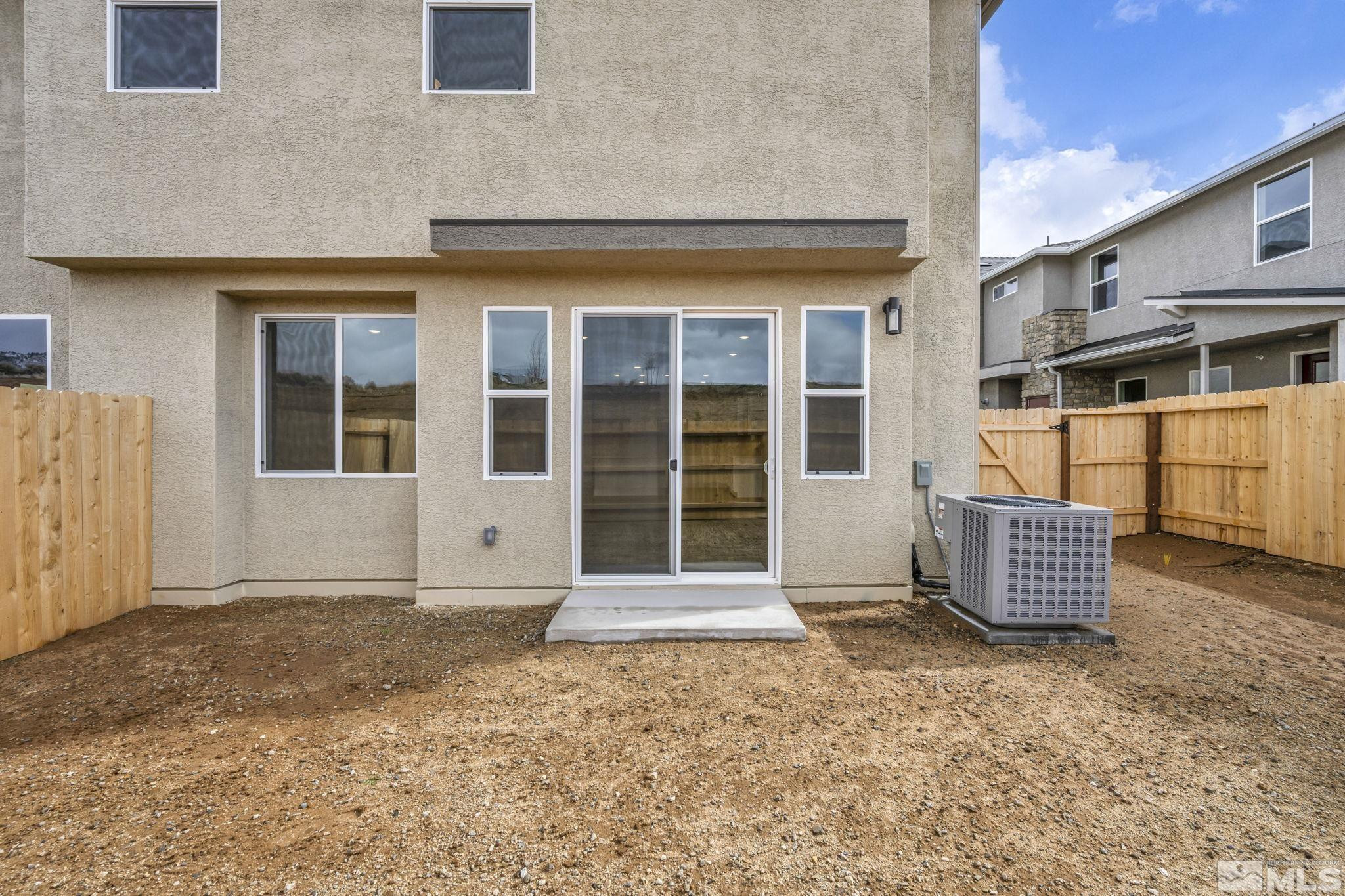 3660 Flare Lane, Unit 22 Carson City, NV 89705 - Photo 18 of 22 a front view of a house with a large window
