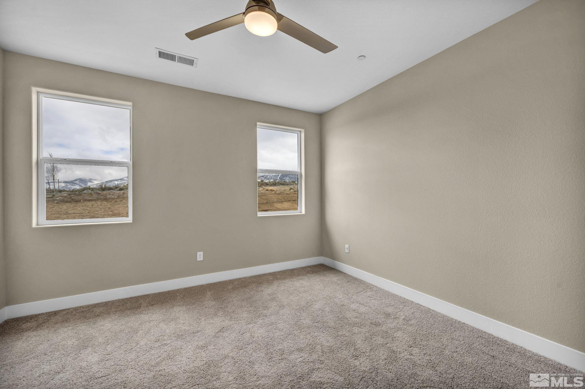 3660 Flare Lane, Unit 22 Carson City, NV 89705 - Photo 10 of 22 an empty room with windows