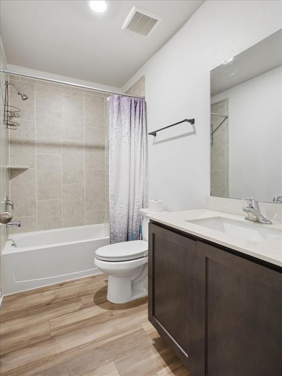 3083 Chillingham Drive Forney, TX 75126 - Photo 16 of 20 a bathroom with a sink a toilet and a bathtub