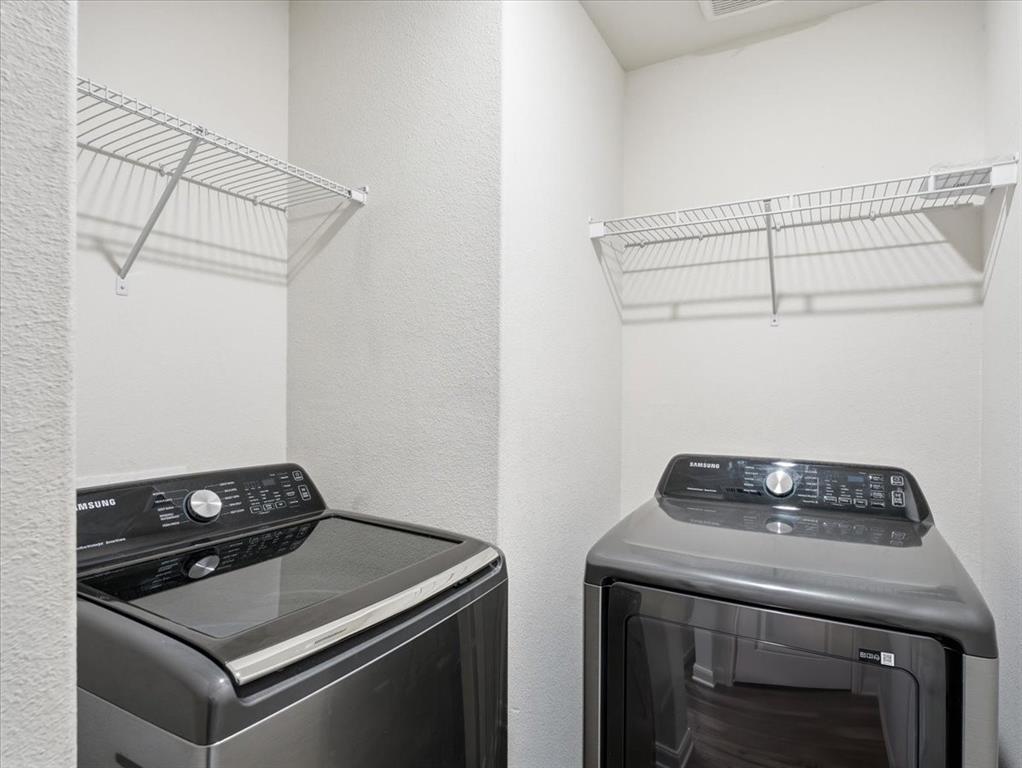 3083 Chillingham Drive Forney, TX 75126 - Photo 17 of 20 a utility room with dryer and washer