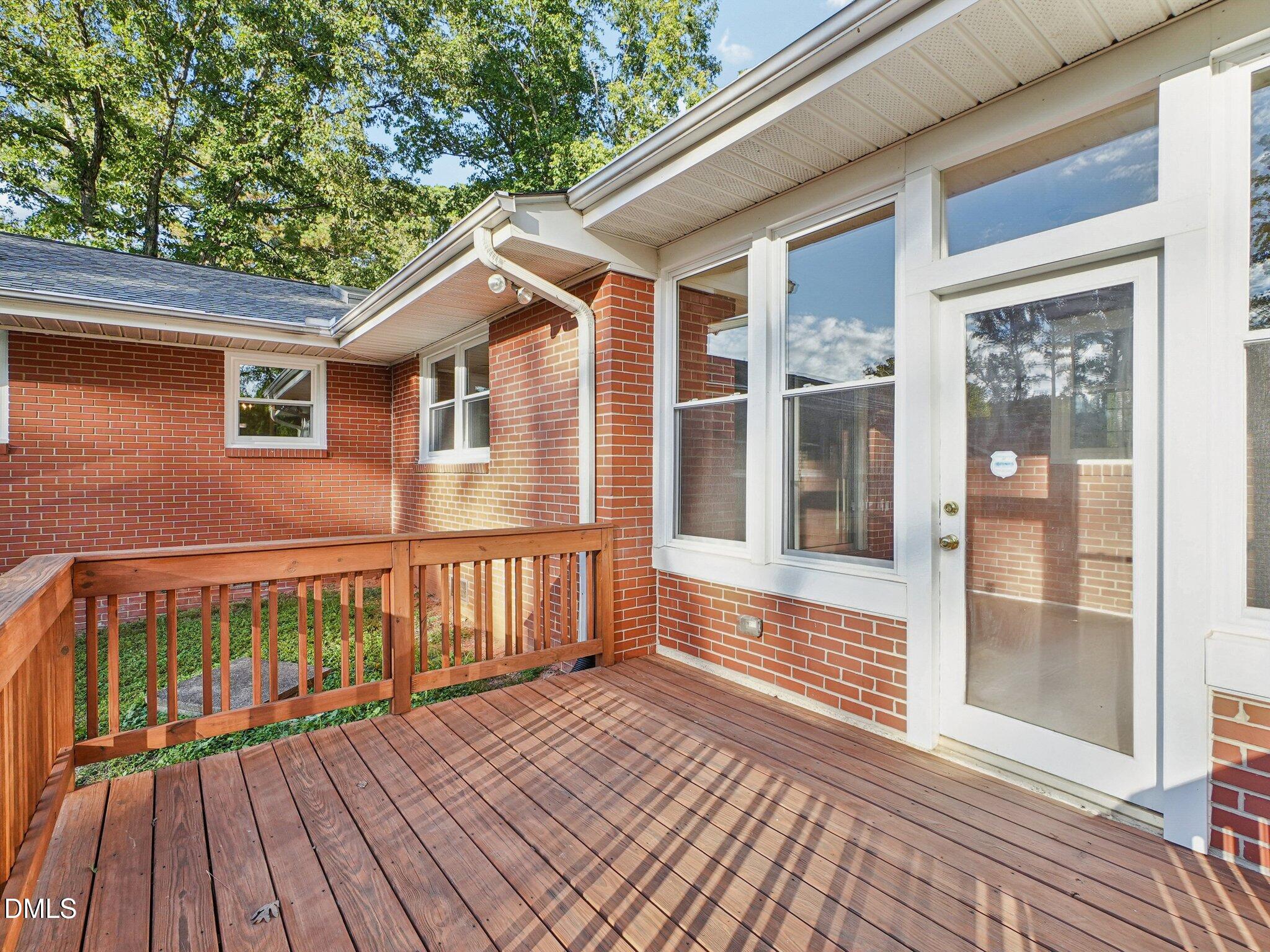 6421 King Lawrence Road Raleigh, NC 27607 - Photo 9 of 52 deck off sunroom