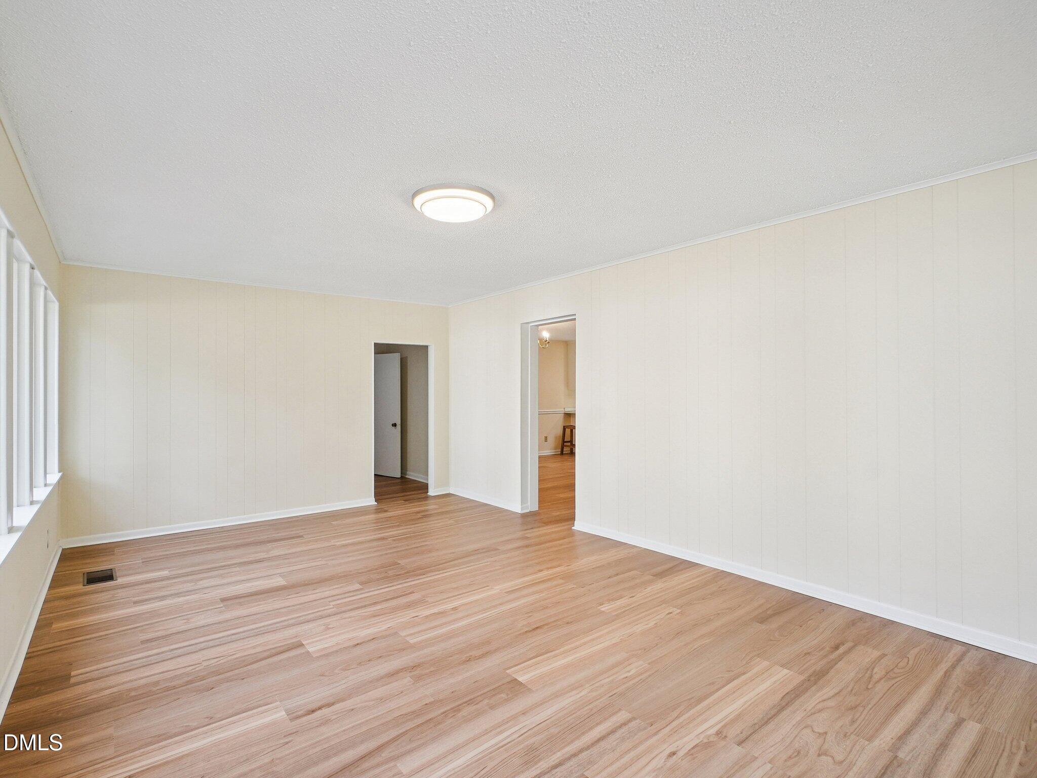 6421 King Lawrence Road Raleigh, NC 27607 - Photo 38 of 52 front room w windows 3
