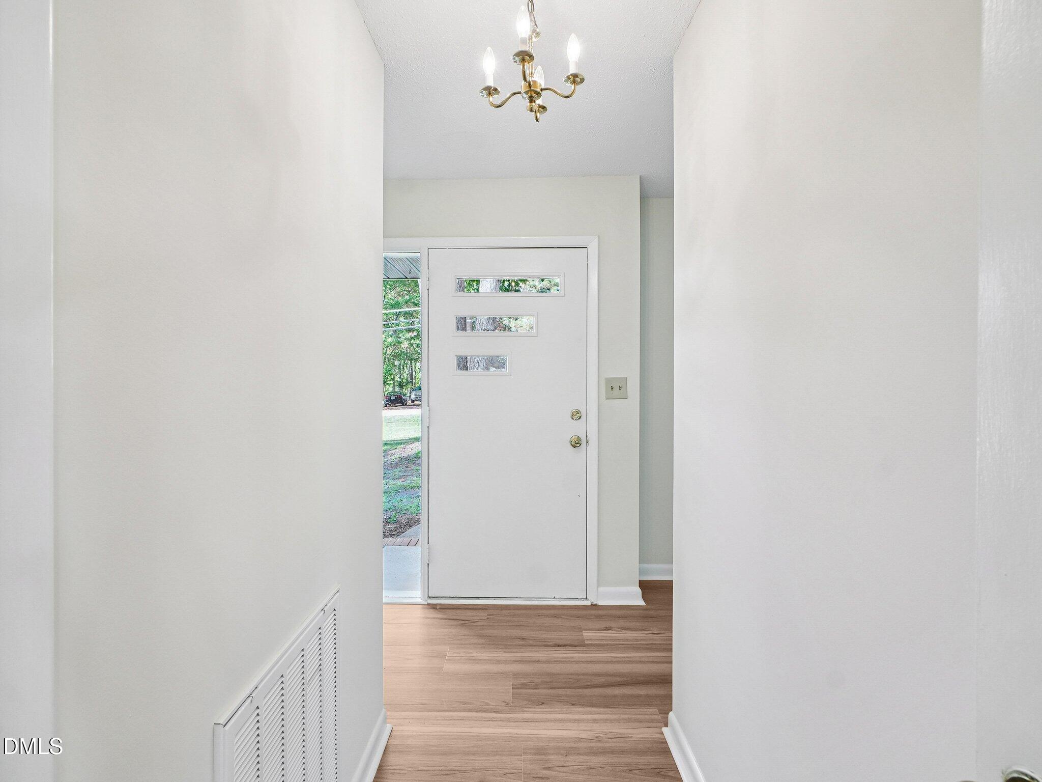 6421 King Lawrence Road Raleigh, NC 27607 - Photo 50 of 52 Foyer entrace