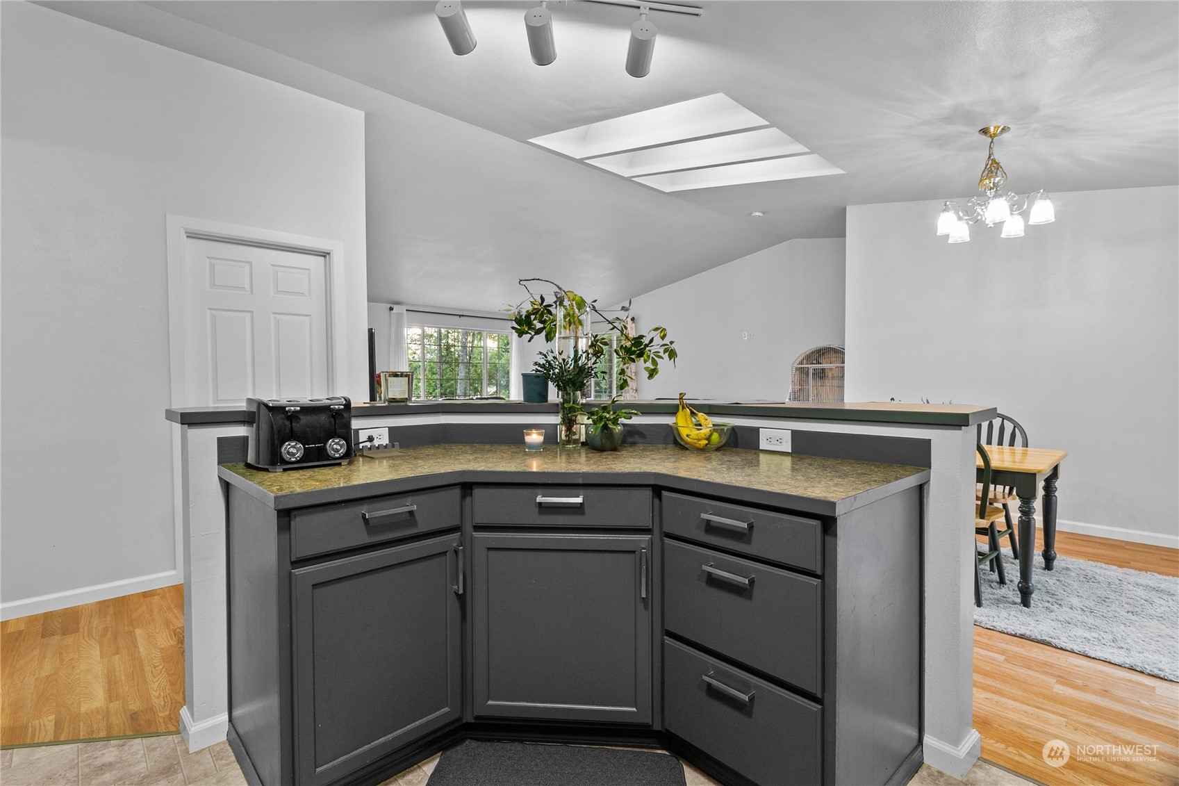 192 Gold Creek Road Northwest Bremerton, WA 98312 - Photo 19 of 38 a kitchen with cabinets a sink and appliances