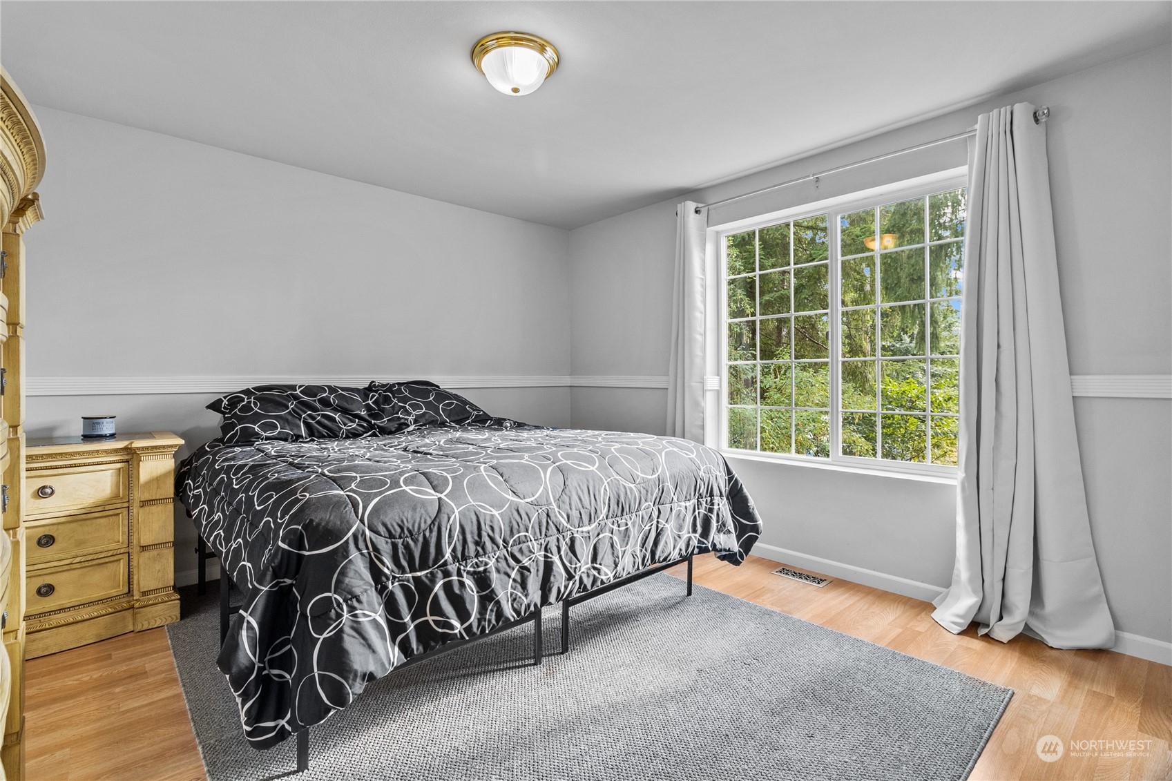 192 Gold Creek Road Northwest Bremerton, WA 98312 - Photo 26 of 38 a bedroom with a bed and a window