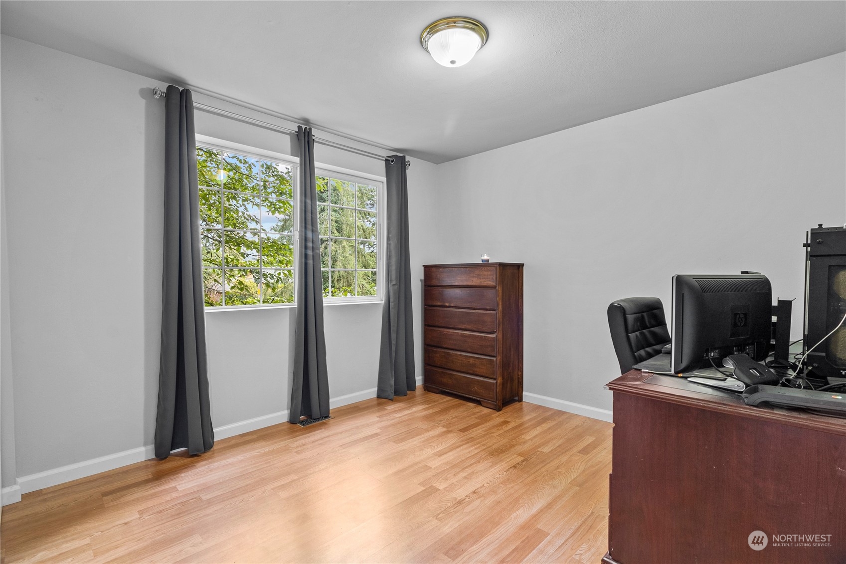 192 Gold Creek Road Northwest Bremerton, WA 98312 - Photo 27 of 38 a bedroom with a bed and a desk