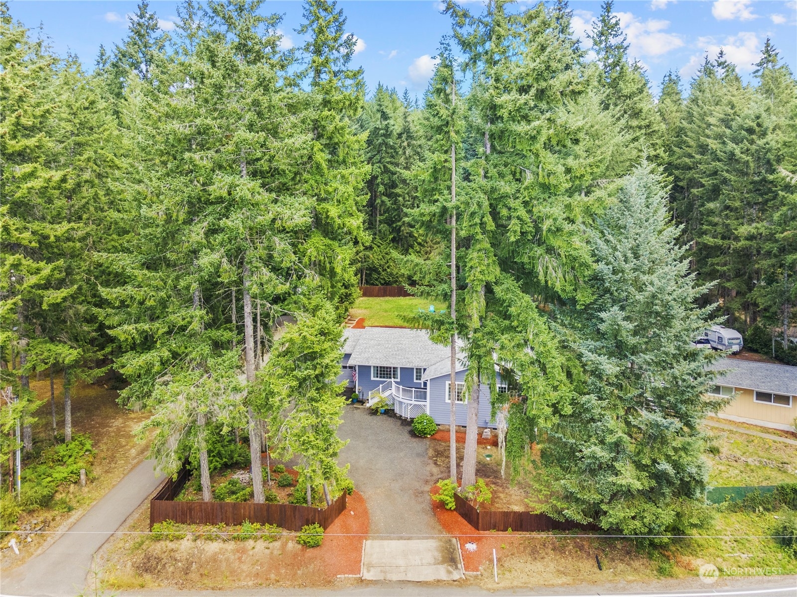 192 Gold Creek Road Northwest Bremerton, WA 98312 - Photo 3 of 38 an aerial view of a house with a yard basket ball court and outdoor seating