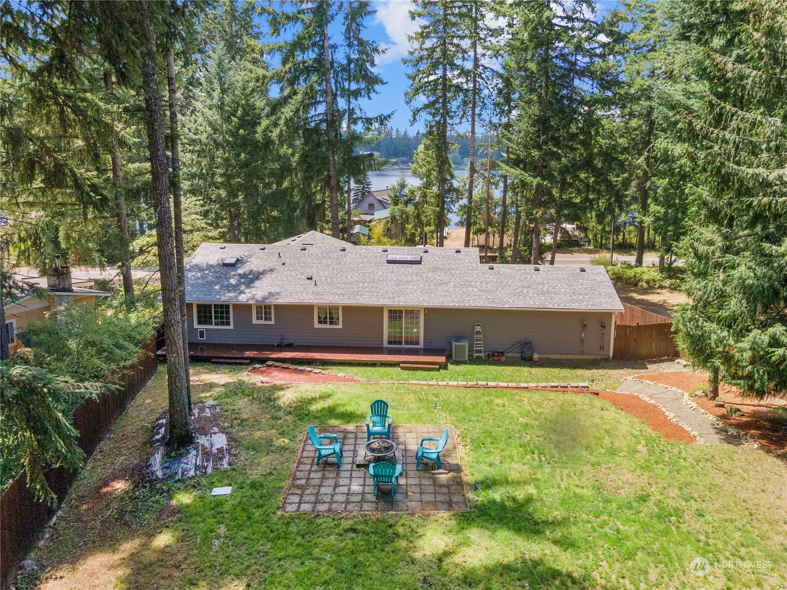 192 Gold Creek Road Northwest Bremerton, WA 98312 - Photo 32 of 38 an aerial view of a house with swimming pool garden and patio