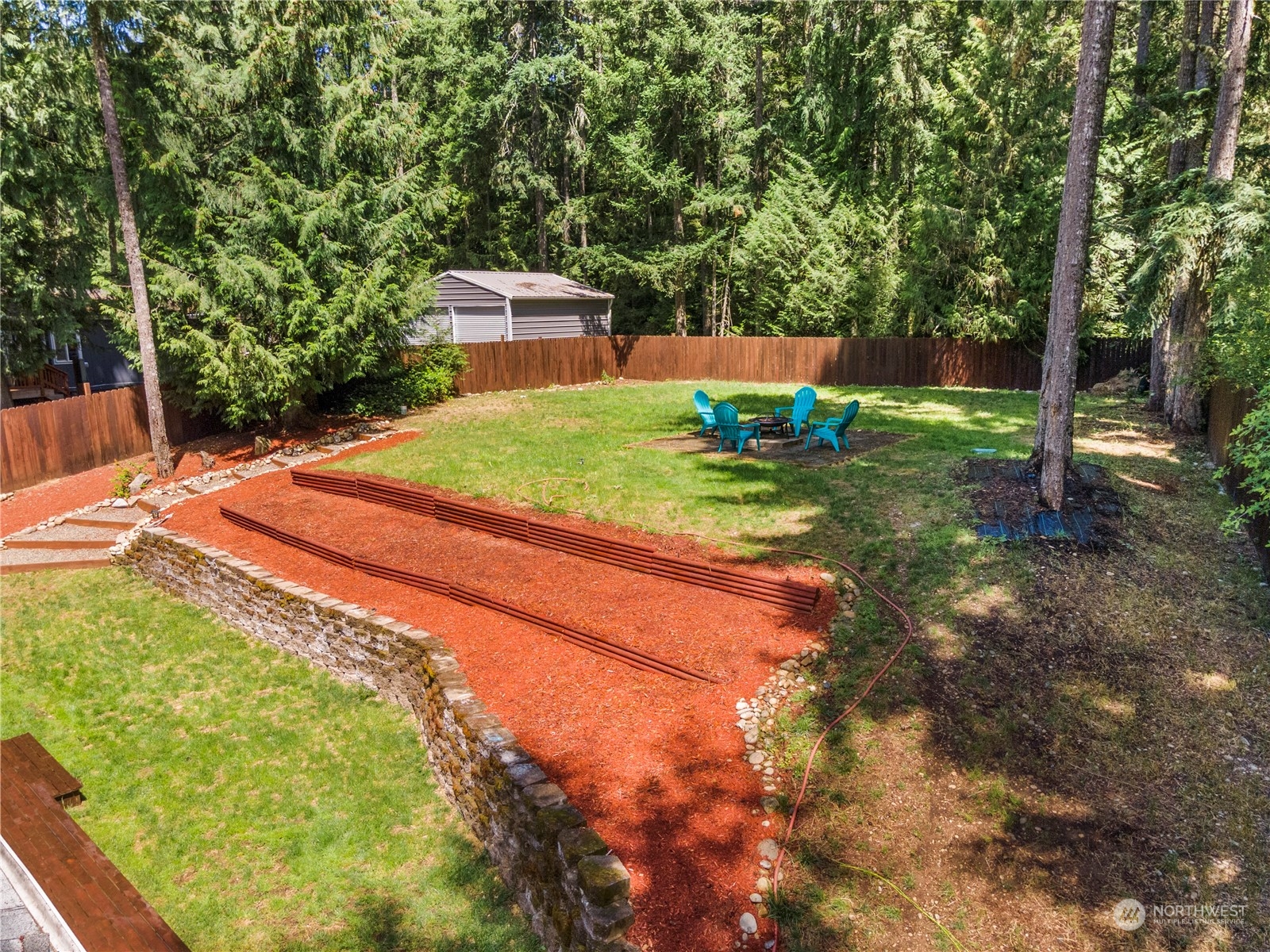 192 Gold Creek Road Northwest Bremerton, WA 98312 - Photo 33 of 38 a view of a backyard with swimming pool
