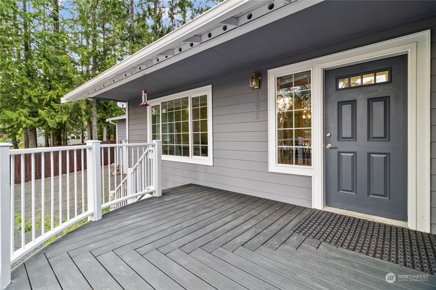 192 Gold Creek Road Northwest Bremerton, WA 98312 - Photo 10 of 38 a view of backyard with deck and wooden floor