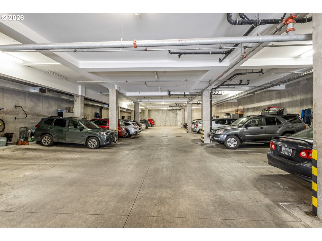 838 Southeast 38th Avenue, Unit 202 Portland, OR 97214 - Photo 30 of 34 a view of parking area with parked cars