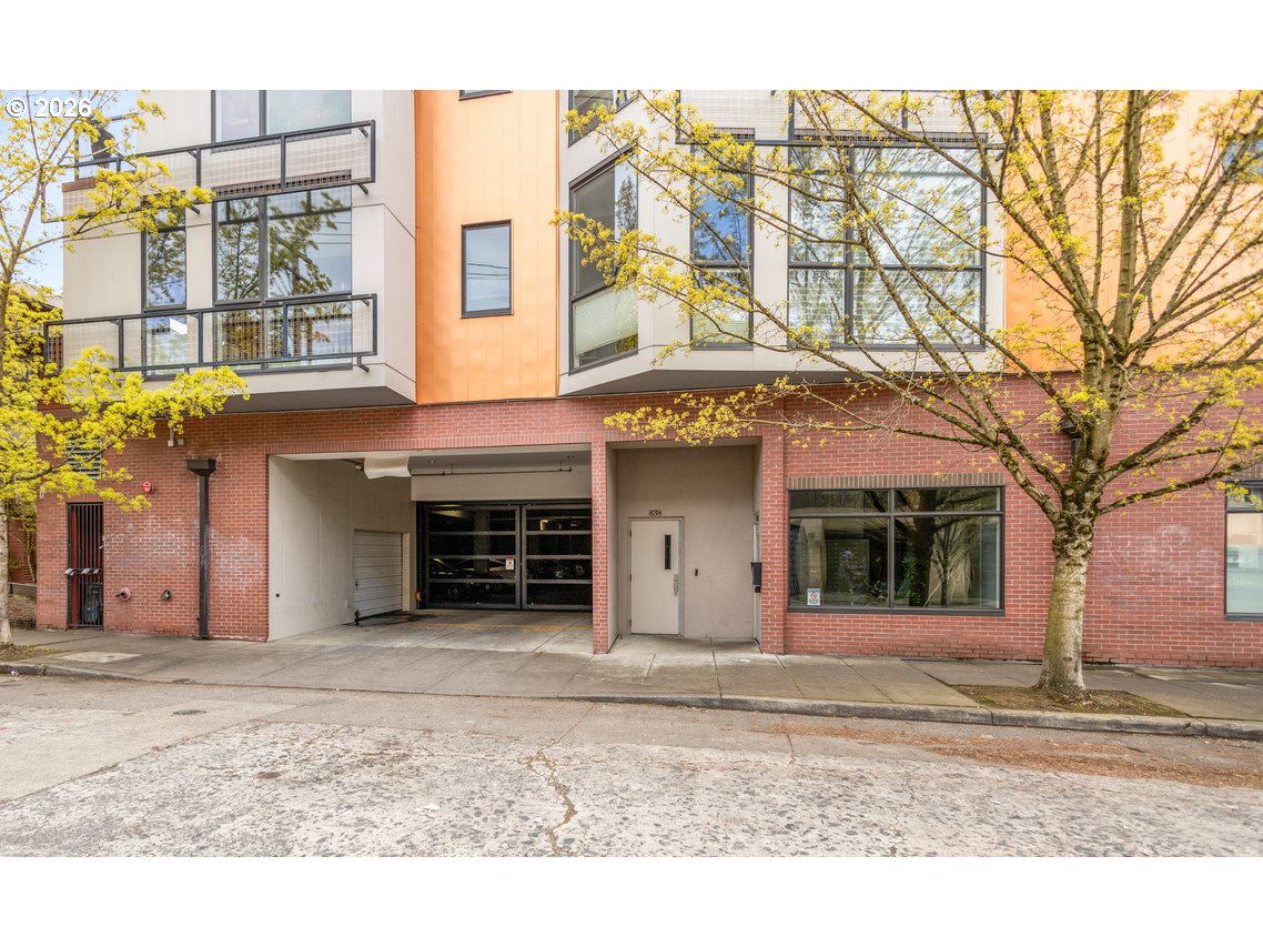 838 Southeast 38th Avenue, Unit 202 Portland, OR 97214 - Photo 3 of 34 a view of a building with a porch
