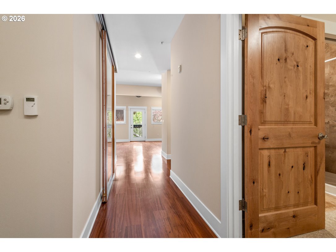 838 Southeast 38th Avenue, Unit 202 Portland, OR 97214 - Photo 6 of 34 a view of a hallway with wooden floor