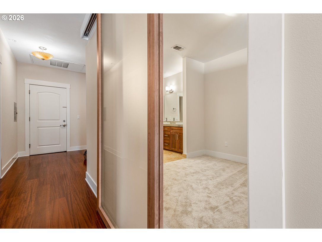 838 Southeast 38th Avenue, Unit 202 Portland, OR 97214 - Photo 7 of 34 a view of hallway with wooden floor