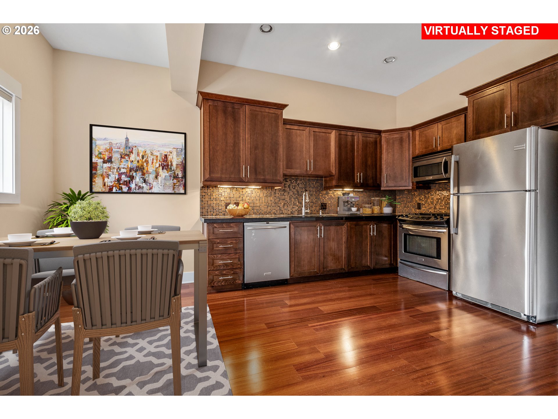 838 Southeast 38th Avenue, Unit 202 Portland, OR 97214 - Photo 10 of 34 a kitchen with stainless steel appliances granite countertop a refrigerator a sink a stove and oven