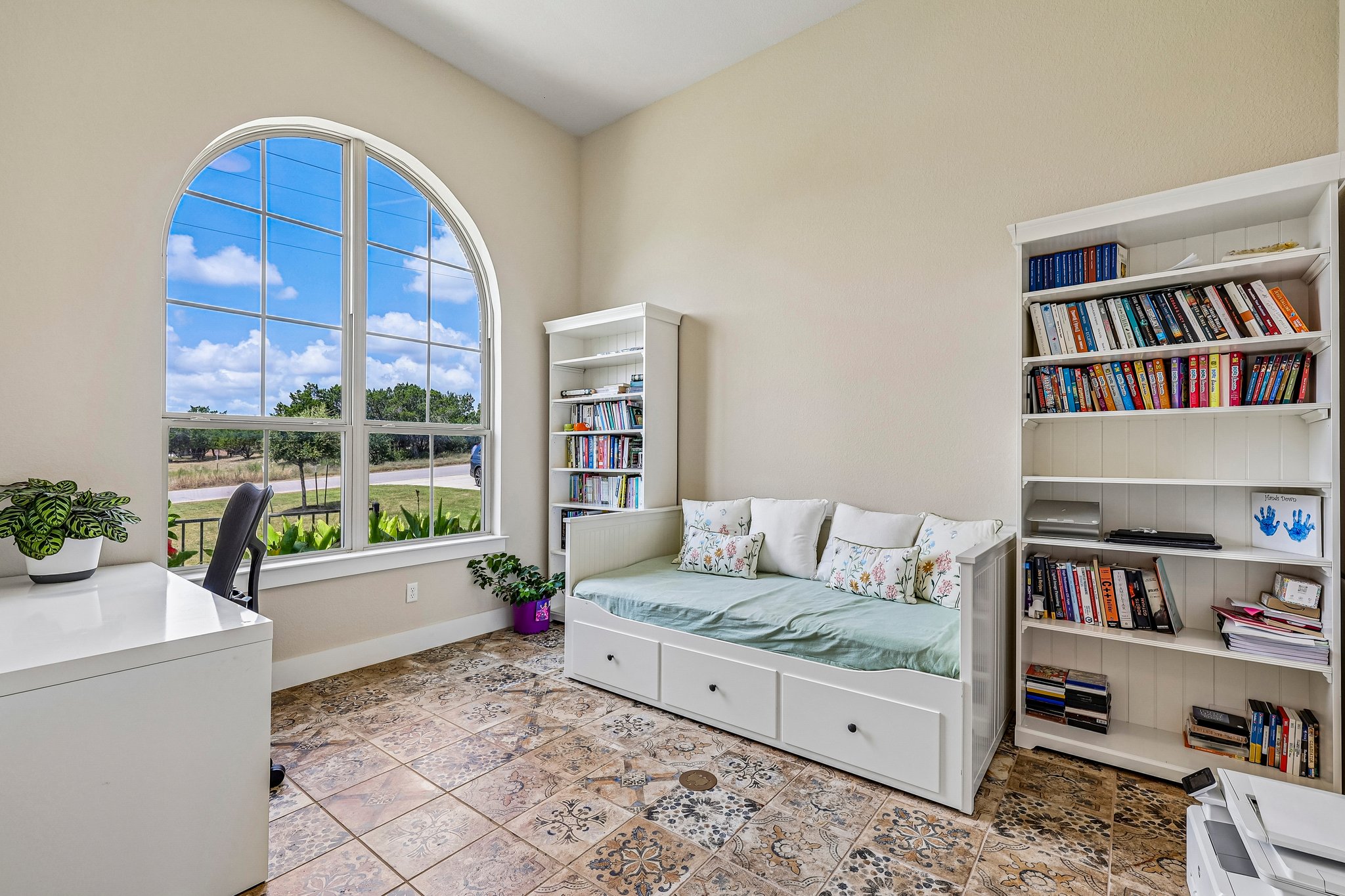1705 Parten Rnch Parkway Austin, TX 78737 - Photo 29 of 39 A graceful arched window illuminates this versatile study with patterned tile flooring and high ceilings.