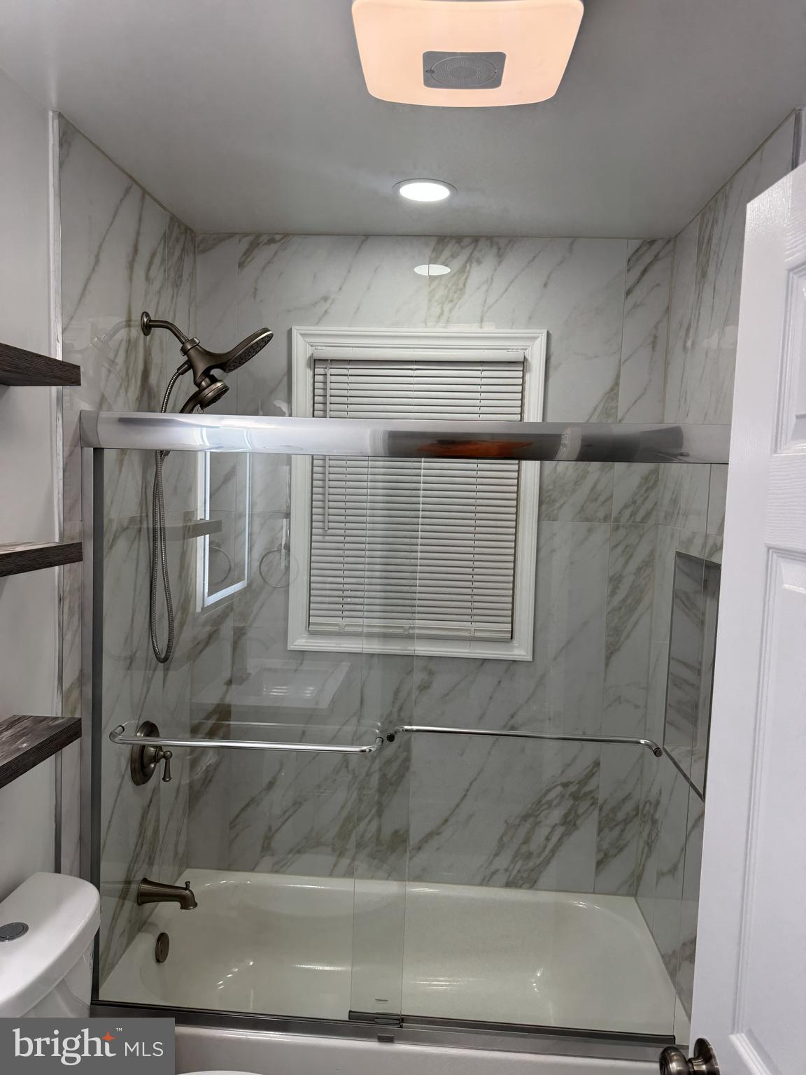 3515 Springdale Avenue District Heights, MD 20747 - Photo 15 of 16 a bathroom with a shower