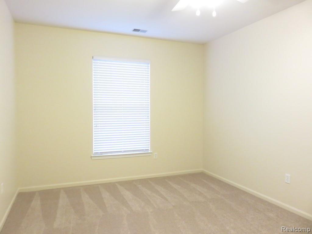 1104 Rial Lake Drive Howell, MI 48843 - Photo 14 of 31 17x11 master also has new carpet and has been very recently repainted