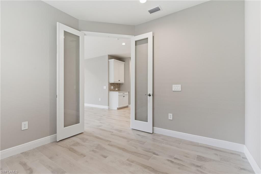 2118 Marquesa Circle Naples, FL 34112 - Photo 19 of 50 wooden floor in a room