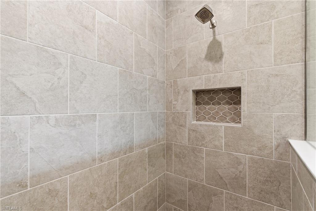 2118 Marquesa Circle Naples, FL 34112 - Photo 35 of 50 a bathroom with a shower