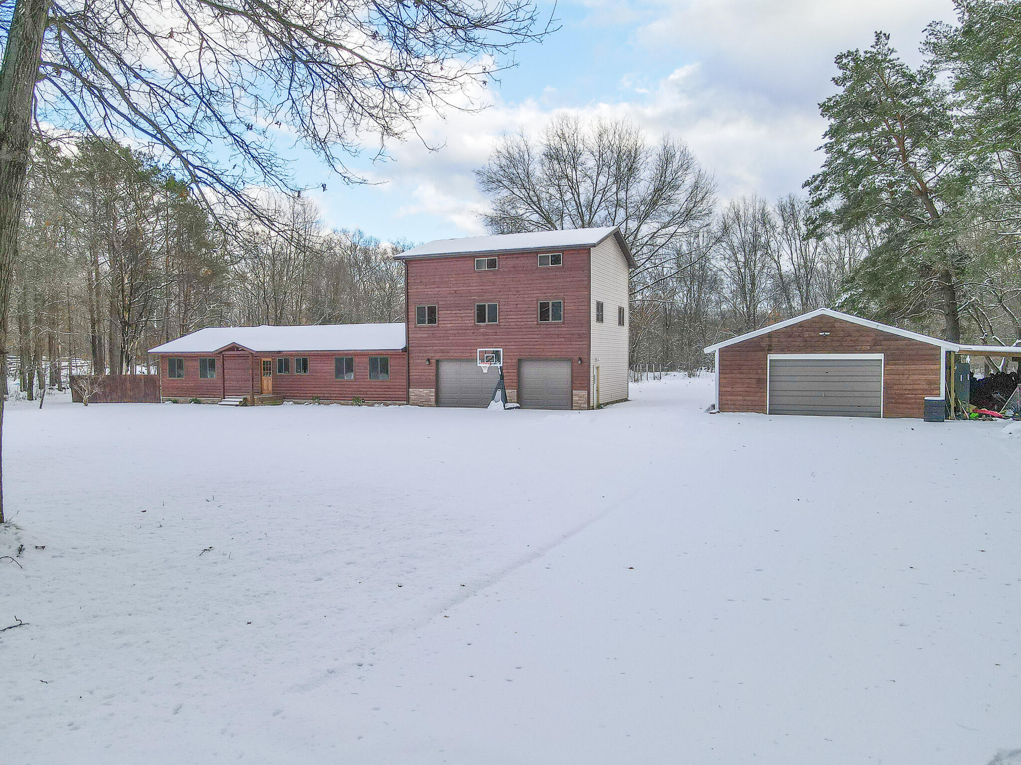 871 East McKinley Road Rothbury, MI 49452 - Photo 1 of 64 dji_fly_20240215_164432_745_170803351495