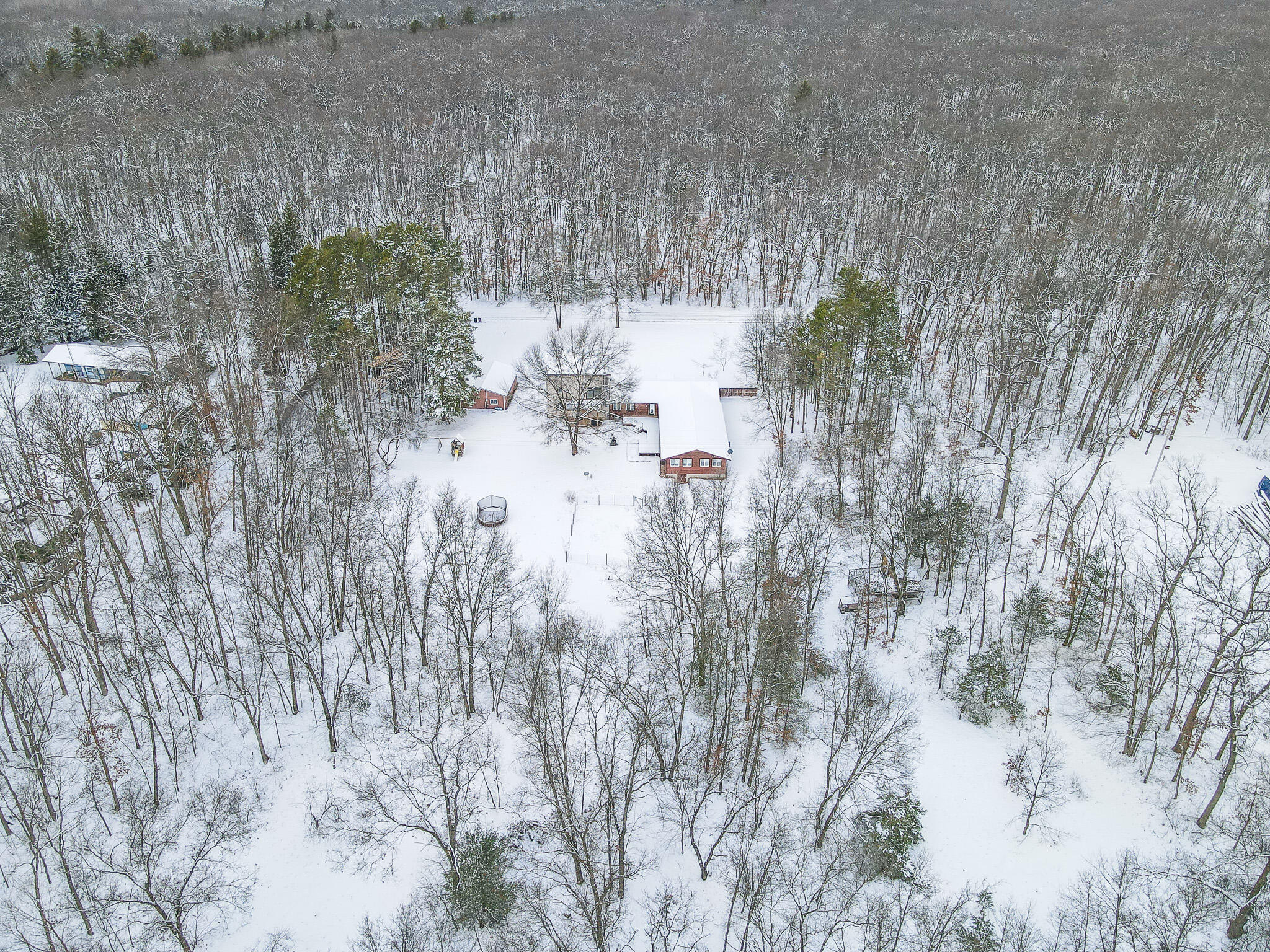 871 East McKinley Road Rothbury, MI 49452 - Photo 6 of 64 dji_fly_20240215_164022_734_170803324103