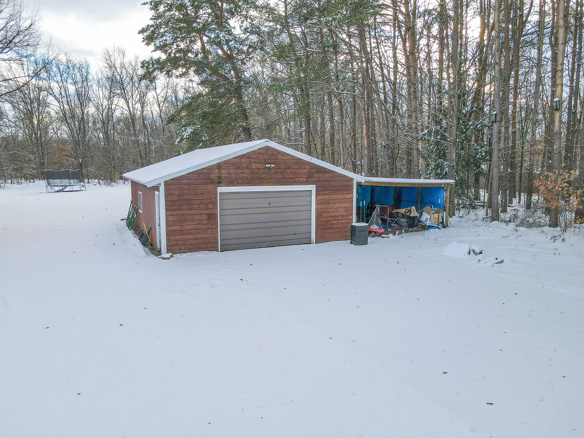871 East McKinley Road Rothbury, MI 49452 - Photo 9 of 64 dji_fly_20240215_165016_765_170803384455