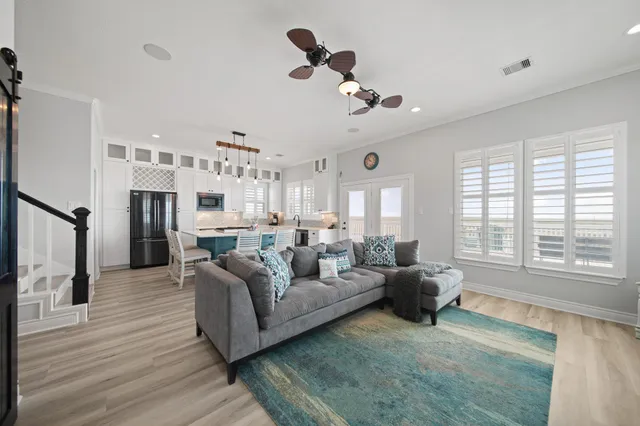 a living room with furniture fireplace and flat screen tv