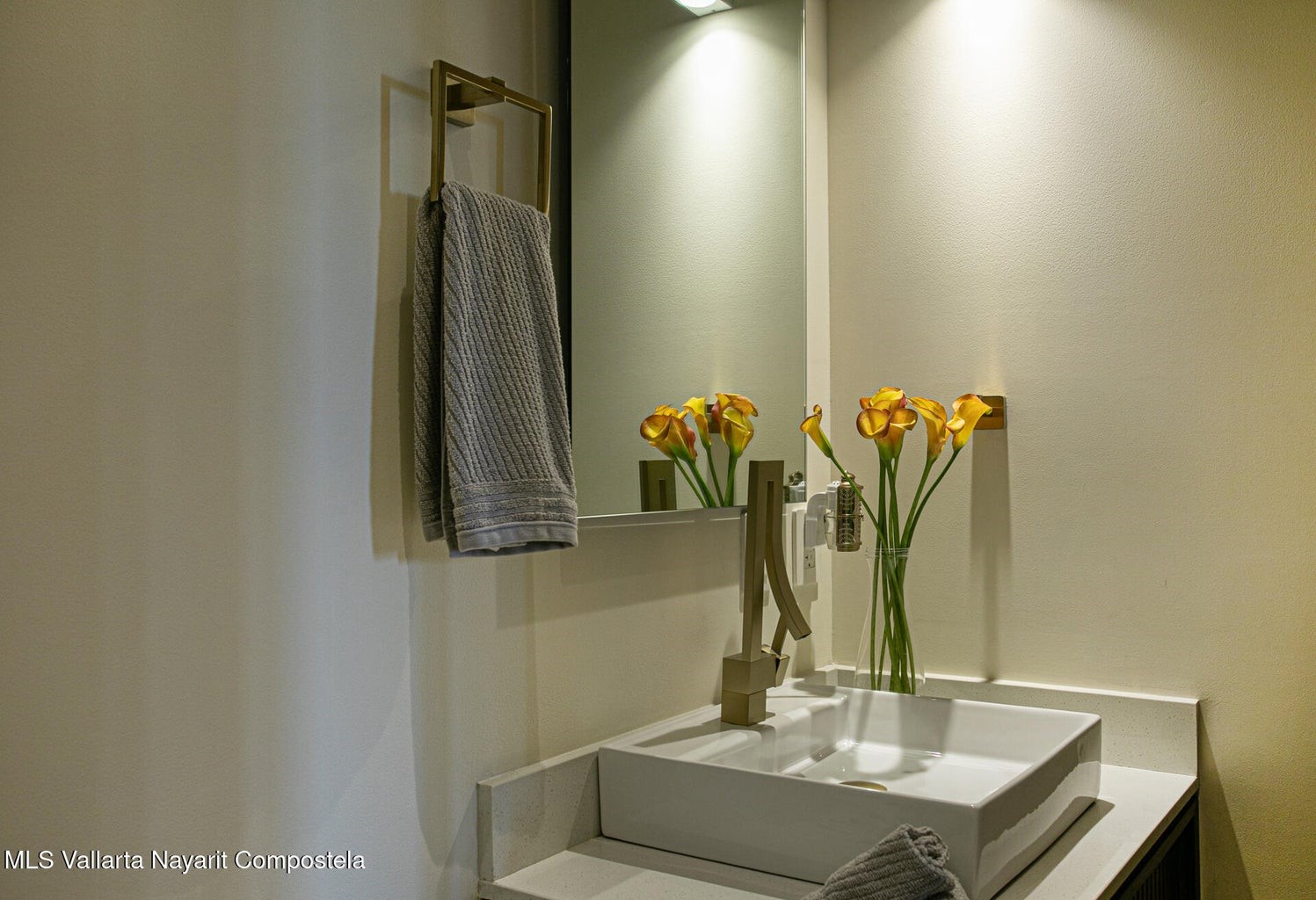 263 Calle Roma, Unit 504 Davisburg, undefined 48350 - Photo 12 of 25 a bathroom with a sink and a mirror