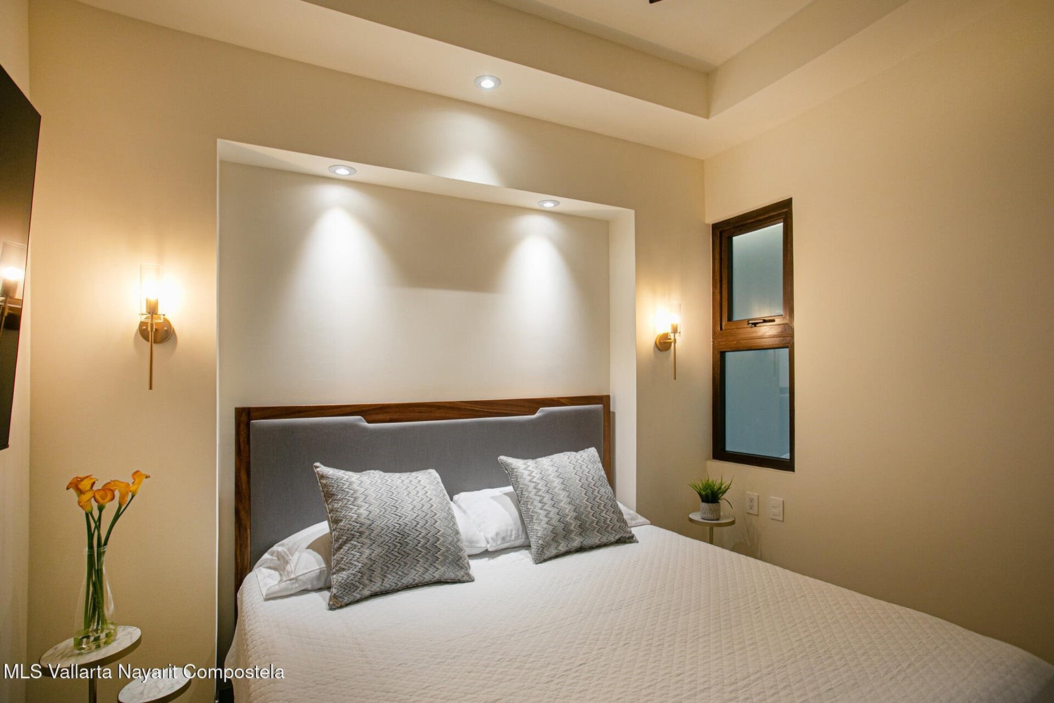 263 Calle Roma, Unit 504 Davisburg, undefined 48350 - Photo 13 of 25 a bedroom with a bed and a mirror