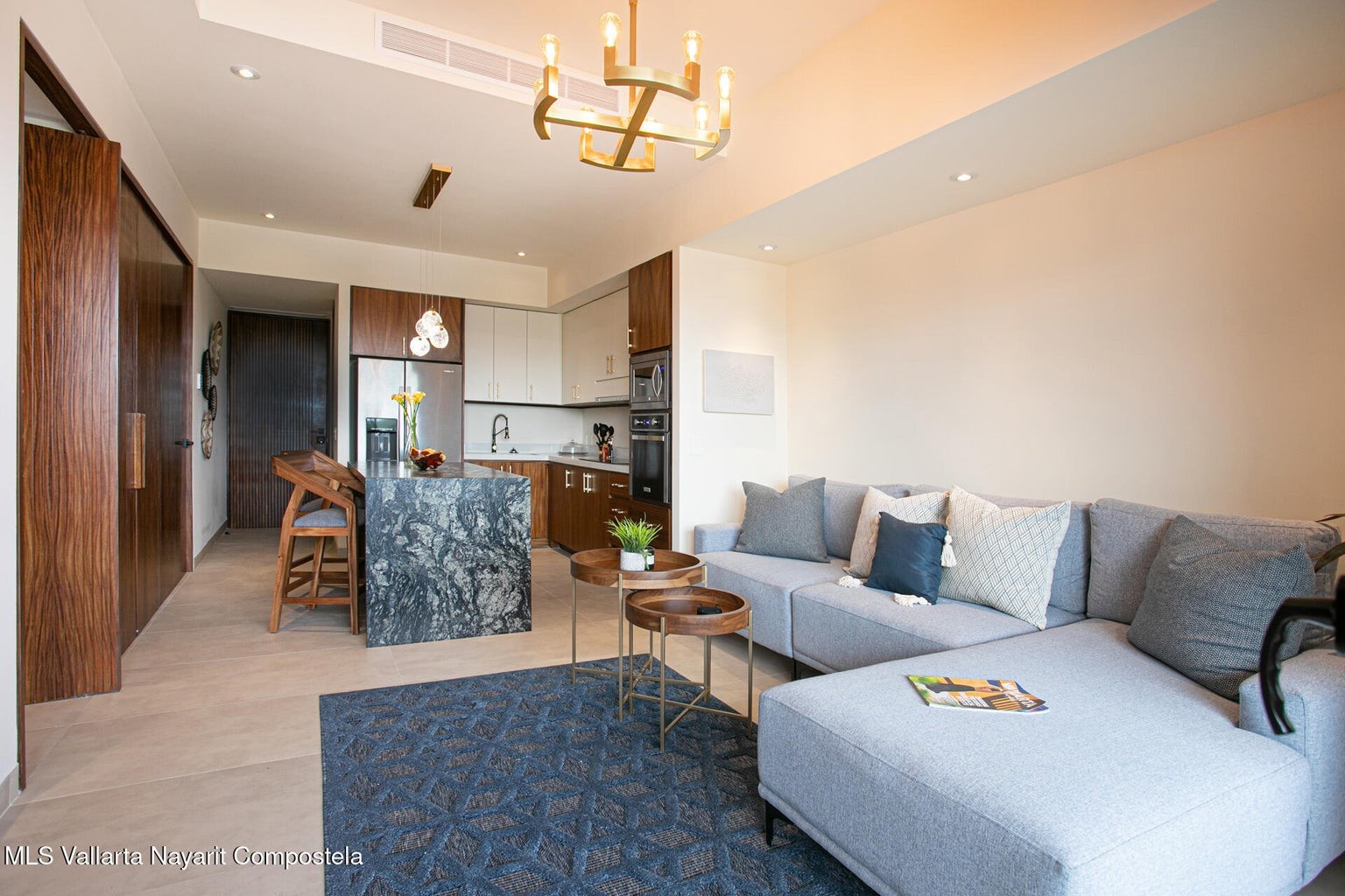 263 Calle Roma, Unit 504 Davisburg, undefined 48350 - Photo 5 of 25 a living room with furniture and kitchen view