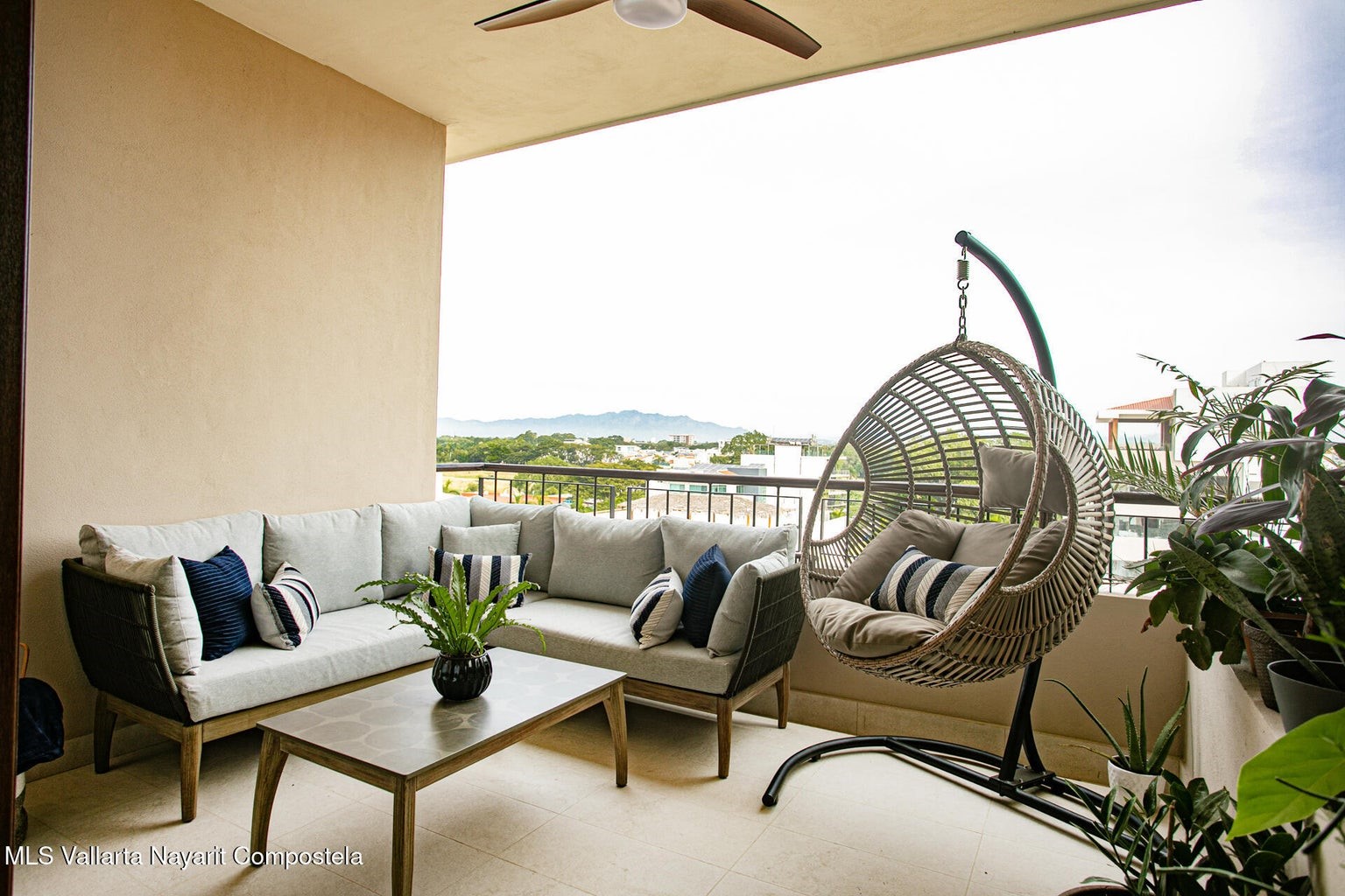 263 Calle Roma, Unit 504 Davisburg, undefined 48350 - Photo 7 of 25 a roof deck with couches and potted plants