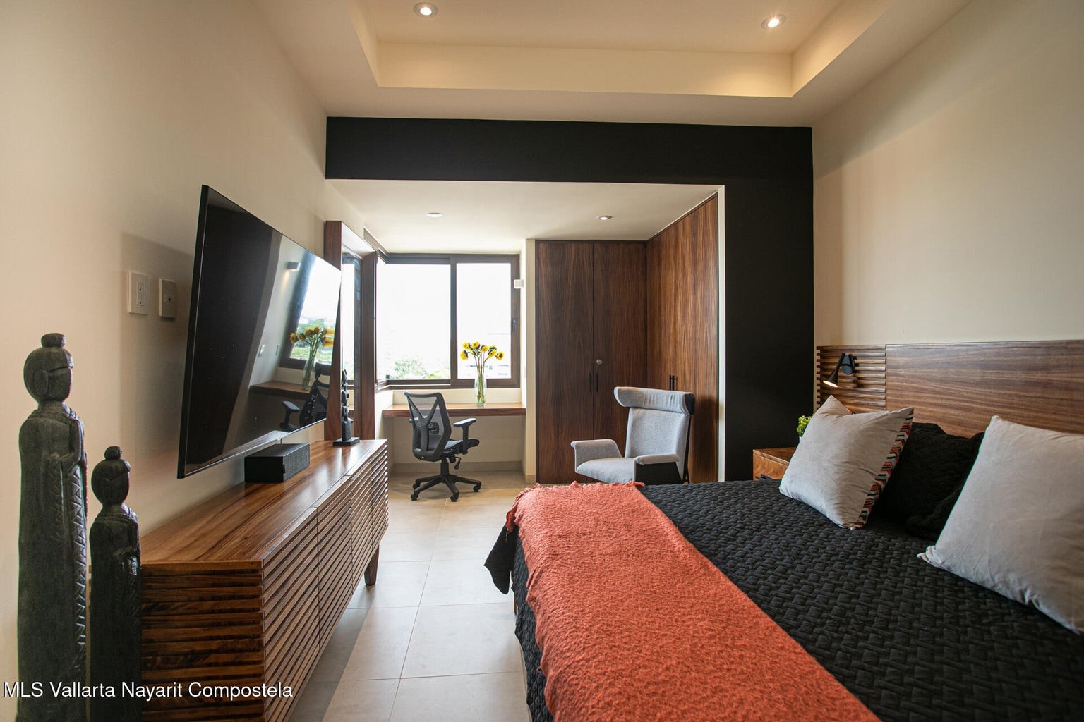 263 Calle Roma, Unit 504 Davisburg, undefined 48350 - Photo 8 of 25 a bedroom with a bed and a flat tv screen