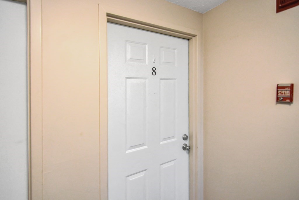 175 Willard Street, Unit 8 Lowell, MA 01850 - Photo 18 of 24 a view of a hallway