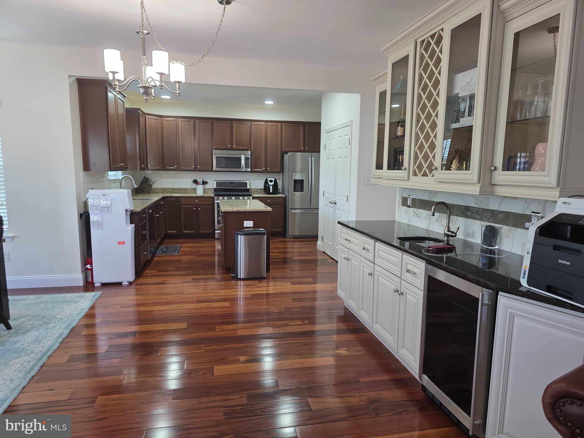 53 Buckeye Road Swedesboro, NJ 08085 - Photo 10 of 47 Modern kitchen with rich wood tones.